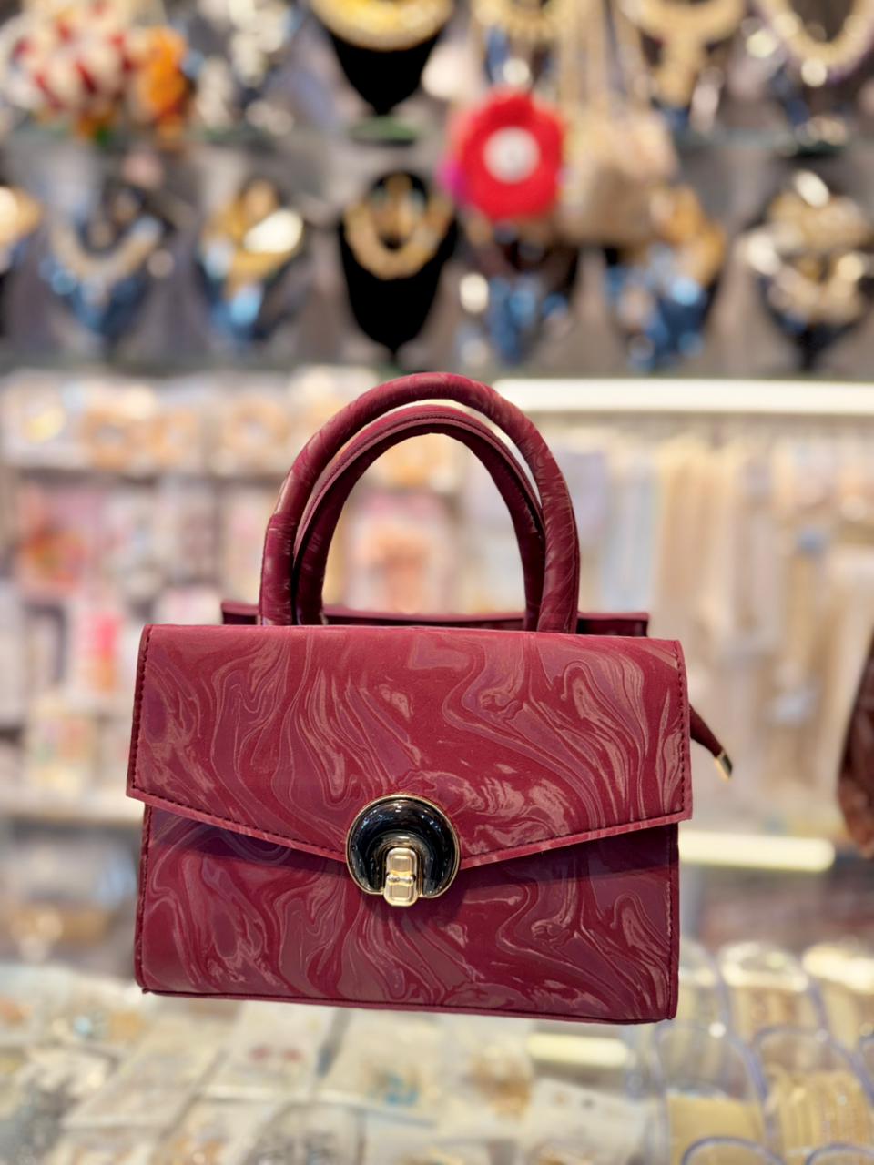Trendy soft mahroon color Handbag